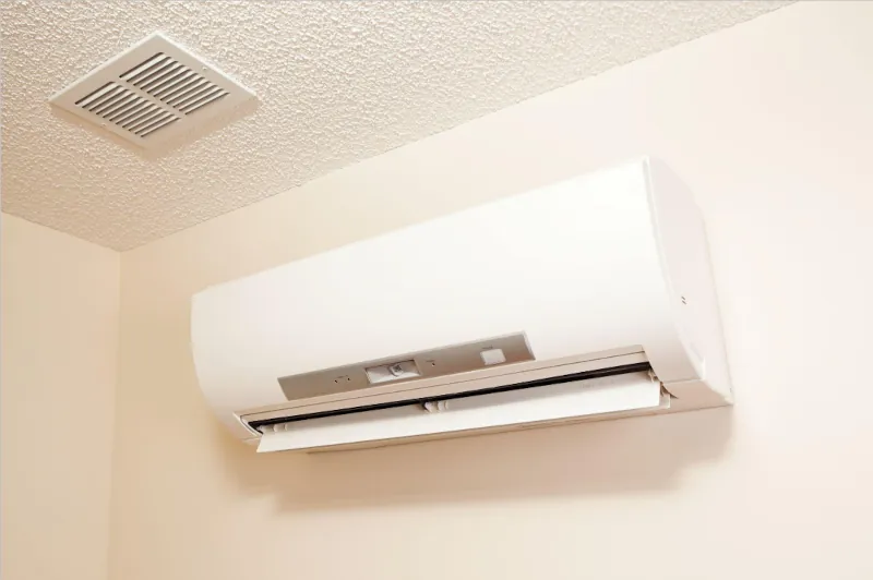 Ductless heater mounted near top of wall - Peter Levi